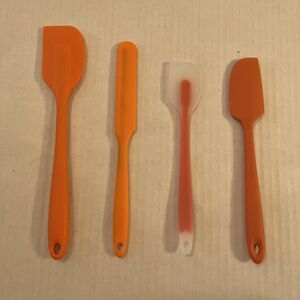 Set Of Four Silicone Orange Spatulas And Scrapers